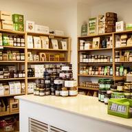 Park Slope specialty food shop interior with stacked shelves and a polished counter